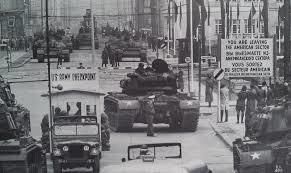 US and Soviet tanks face one another at Checkpoint Charlie, just 75 metres apart