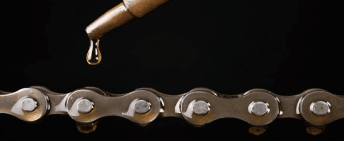 Applying grease on the surface of iron tool