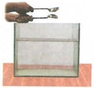 Fig. 10.6(a): Tapping two spoons against eachother in  air