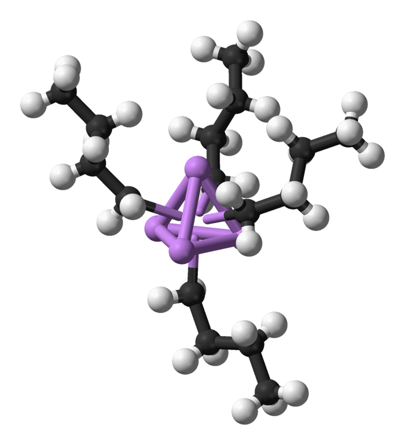 n-Butyllithium, an organometallic compound. Four lithium atoms (in purple) form a tetrahedron, with four butyl groups attached to the faces (carbon is black, hydrogen is white). 